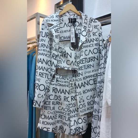 Three-piece set including top shorts and Brazilian luxury brand blazer.